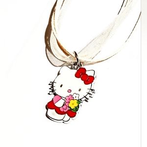 Hello Kitty Holding Flower Bouquet Wearing Red Dress Ribbon Necklace